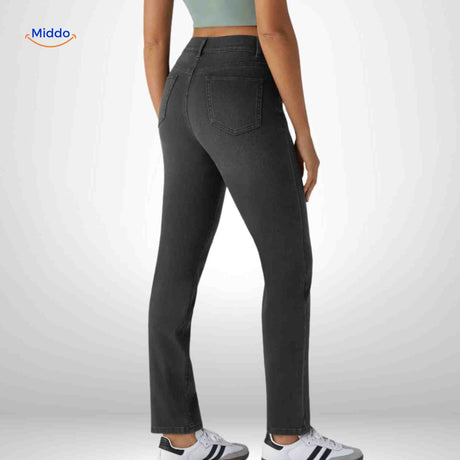 Flexiva black slim-fit jeans viewed from back with sleek styling.