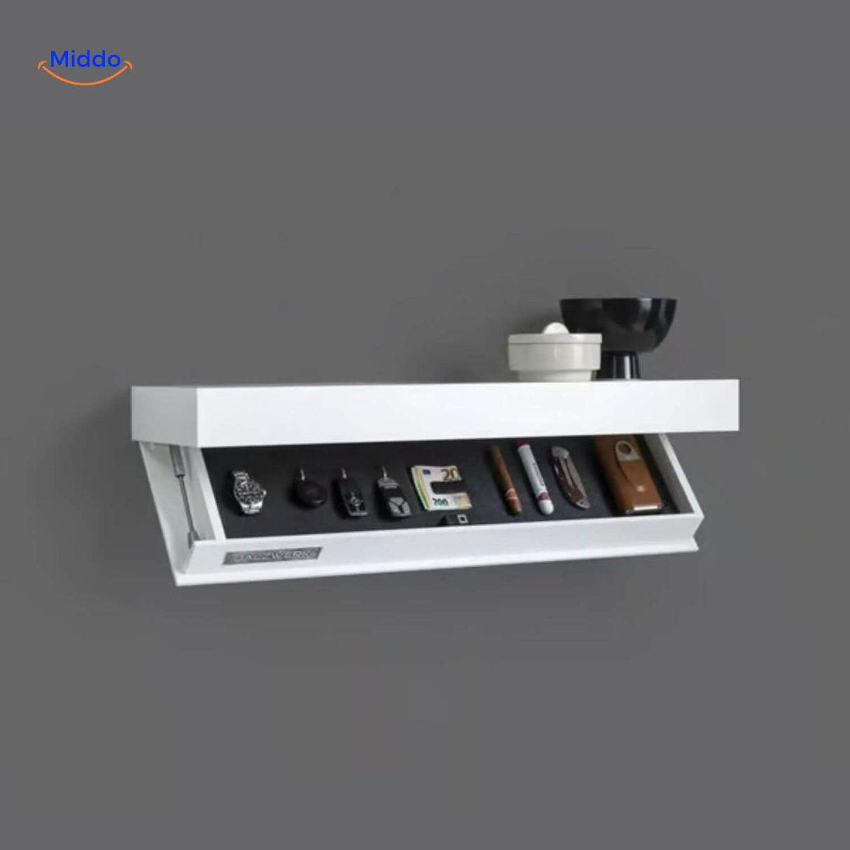 White floating shelf with office supplies and accessories storage compartments.