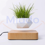 FloatPot levitating plant pot in light brown ceramic finish.