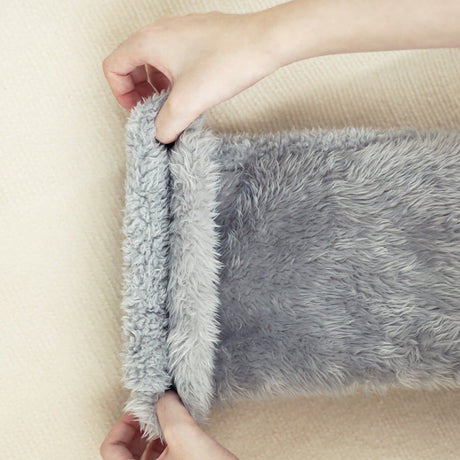 Light gray FluffSoks showcasing rolled cuff and soft interior lining.