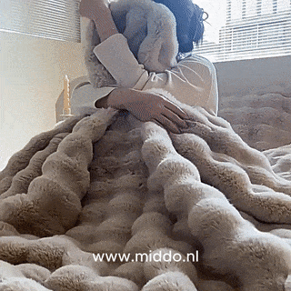 Animated fluffy blanket lifestyle scene showcasing warmth and comfort.