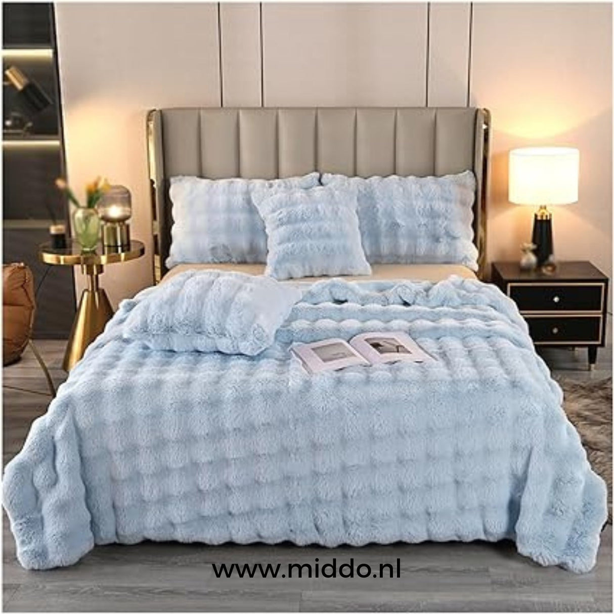 Fluffy winter blanket in light blue faux fur, extra thick and cozy.
