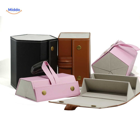 Mix collection of pink, black, and caramel foldable eyeglasses cases shown open side by side.