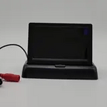 Foldable baby car monitor with cables and simple setup installation.