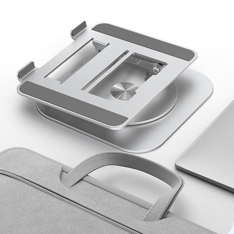 Compact foldable laptop stand for travel and portable workspace solutions.