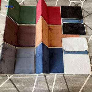 Foldable travel prayer mats laid flat showing all available colors side by side.