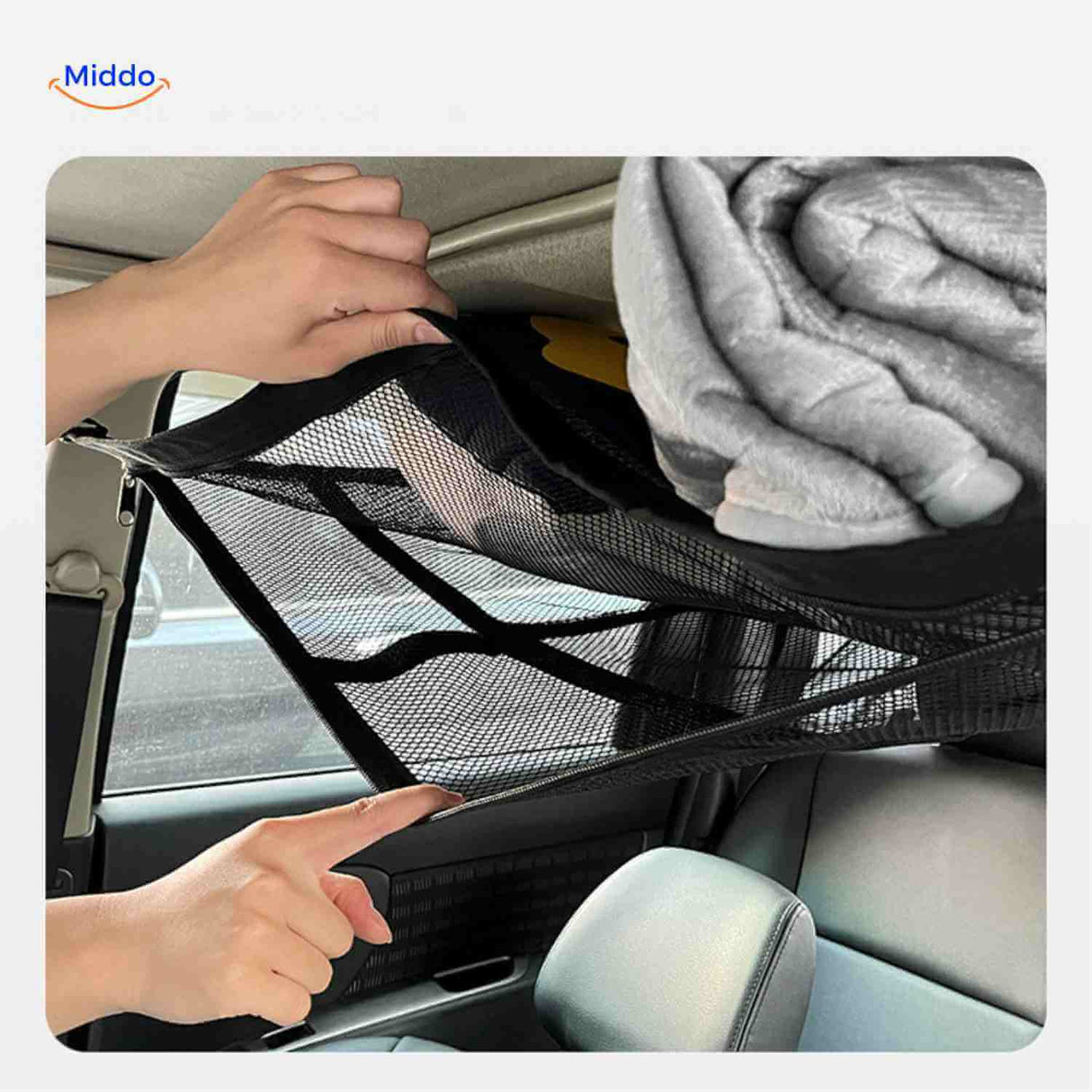 Foldable roof storage net with zipper for blankets, pillows, and bedding.