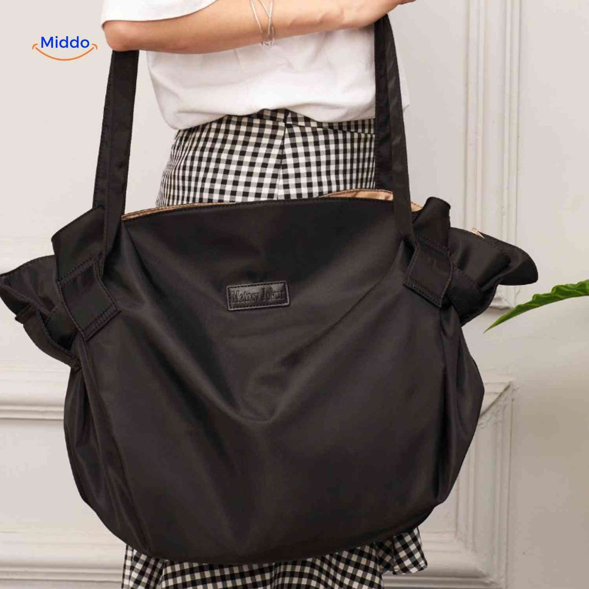 Foldable round storage organizer with multiple compartments for organization.