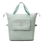 Sage green waterproof expandable travel bag with large capacity and folding design.