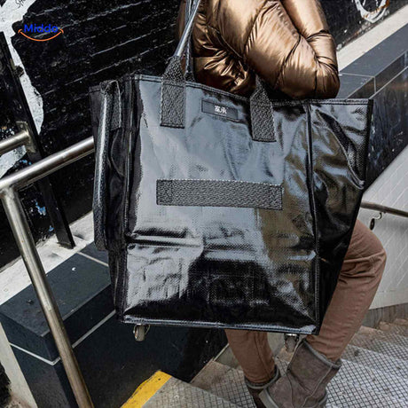 Portable black shopping trolley with smooth wheels ideal for urban mobility