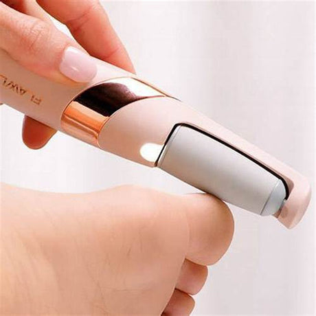 Electric callus remover in action smoothing hardened skin on feet