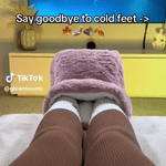 Cozy foot warmer perfect for warming cold feet while watching TV.