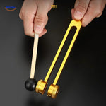 Complete tuning fork therapy set with all therapeutic accessories included.