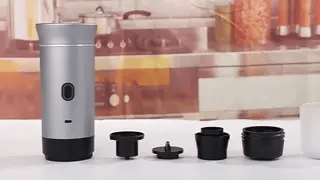 Freshly brewed hot espresso served from the portable machine.