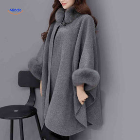 Furina wool cape coat in gray with elegant faux-fur collar trim and comfortable fit.