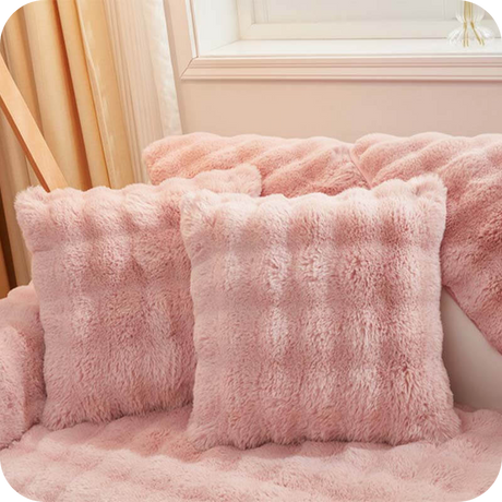 Complete pink plush bundle with furniture covers, pillows and blanket set for warmth.
