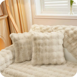 Complete white plush bundle with sofa covers, pillows and blanket for cozy living.