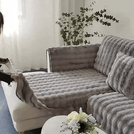 Gray luxury plush covers featuring non-slip backing for secure, wrinkle-free furniture fit.