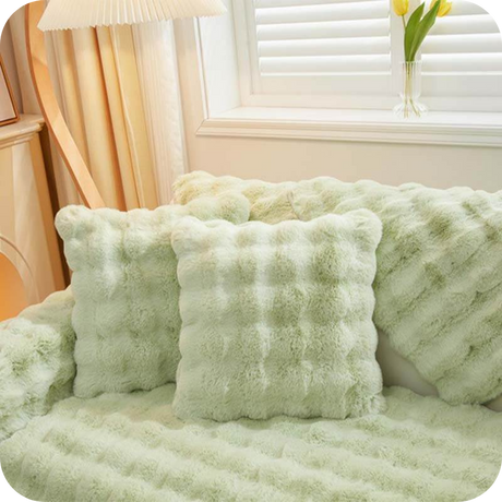 Green luxury plush covers with non-slip backing technology for secure furniture protection.