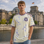 Germany 2026 World Cup supporter jersey in cream tone variant.