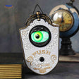 Green glowing eye doorbell with spooky Halloween design