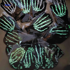 Glowing skeleton hand gloves that light up with LED glow effect.