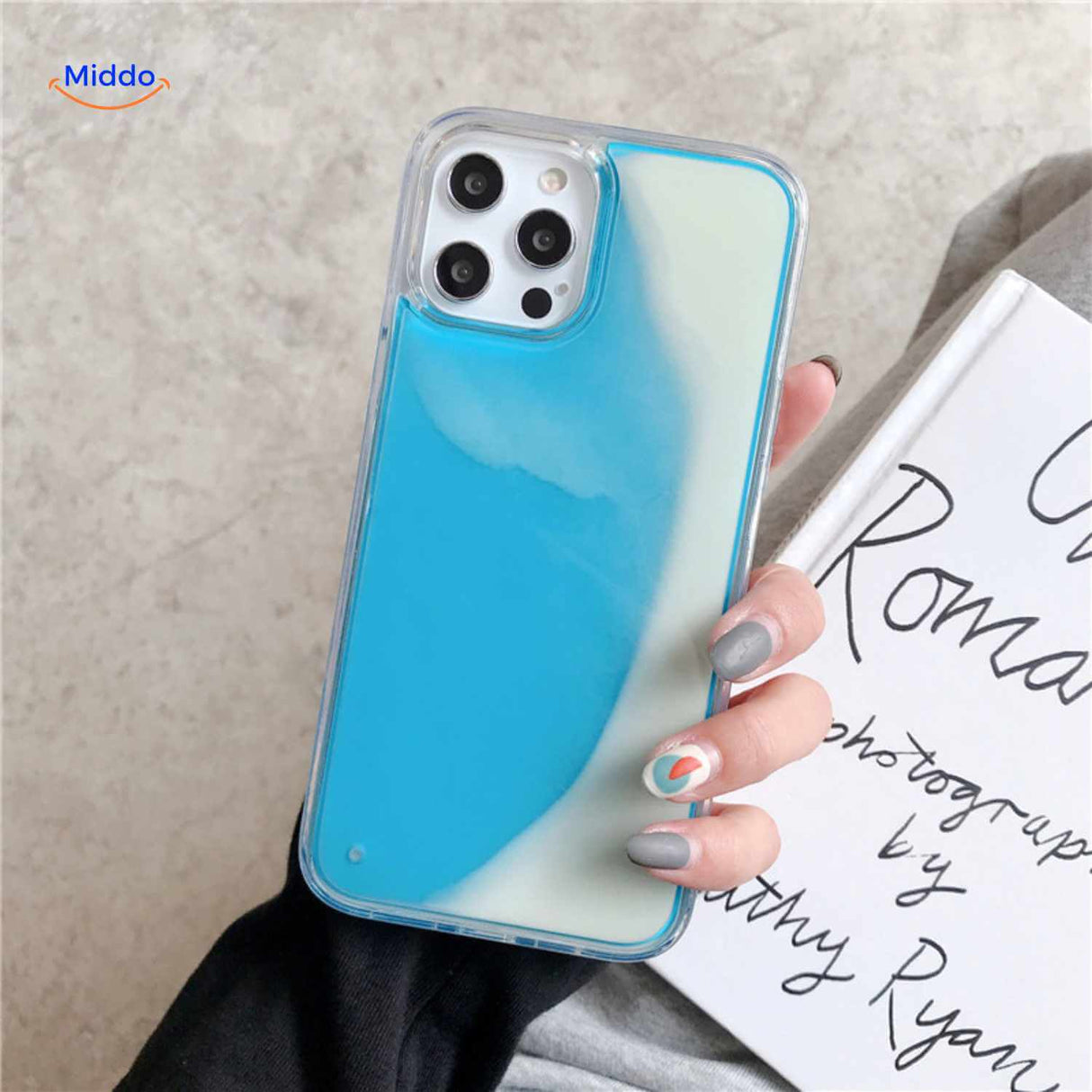 GlowSand phone case features blue and white flowing liquid sand design.