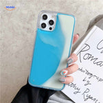 GlowSand phone case features blue and white flowing liquid sand design.