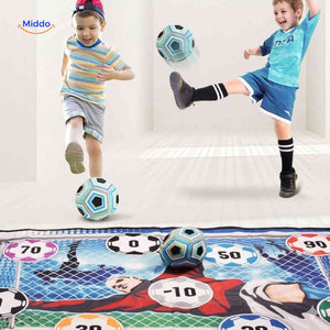 Kids practicing soccer shooting with GoalPlay game indoors.