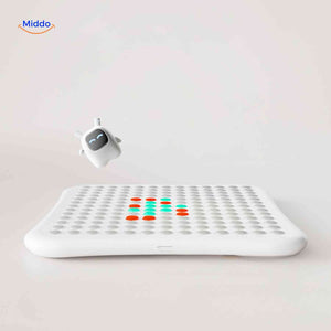 Interactive LED matrix board with smiling robot design for engaging AI gameplay.