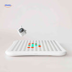 Interactive LED matrix board with smiling robot design for engaging AI gameplay.