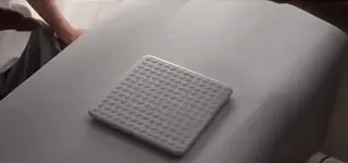 LED matrix game board with clean minimalist white design and interface.