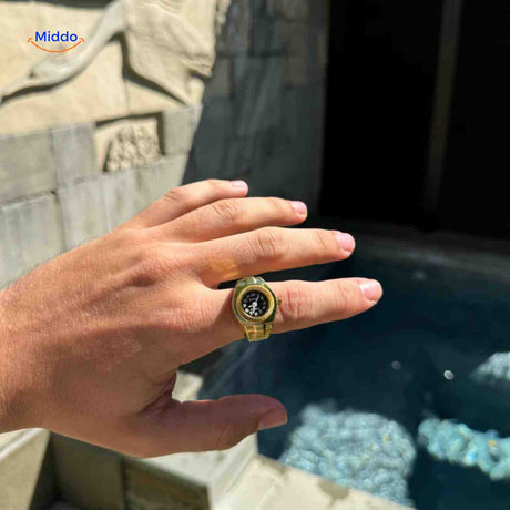 Gold mens ring watch with quartz movement and masculine design.