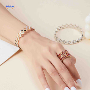 Gold ring and bracelet combo with crystal rhinestone embellishments.