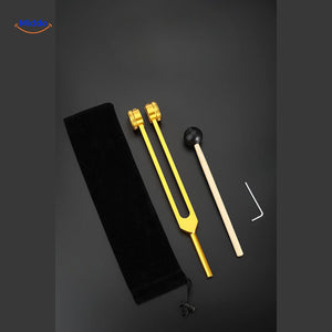 Gold and silver tuning forks showing size specifications and measurements.