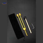 Gold and silver tuning forks showing size specifications and measurements.