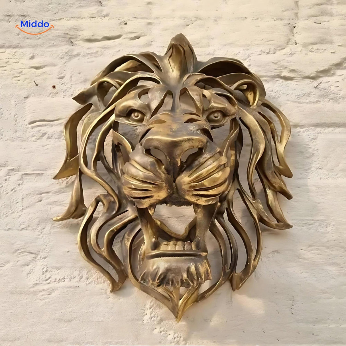 Golden lion head resin sculpture wall mounted in a modern contemporary interior space.