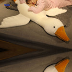 Goosy plush goose with soft oversized wings and cute big feet details.