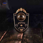 Gothic style Halloween doorbell with glowing eye design