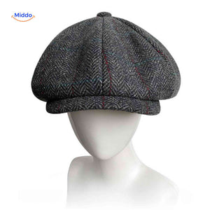 Gray herringbone wool newsboy cap with comfortable all-season fit.