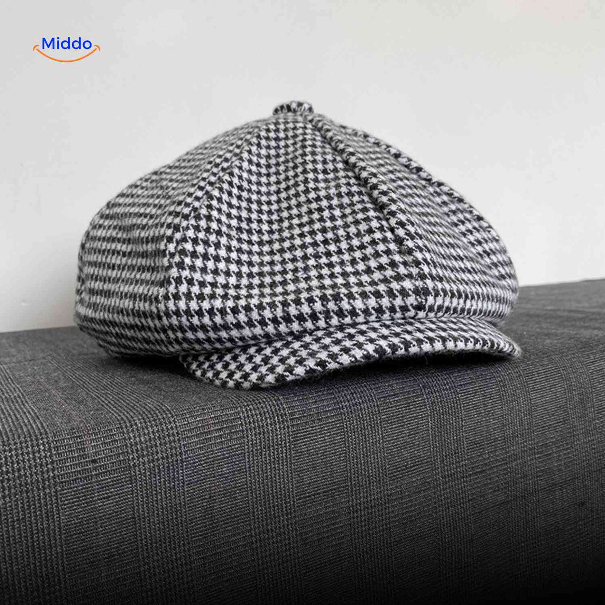Gray houndstooth wool flat cap with timeless vintage heritage design.