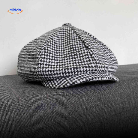 Gray houndstooth wool flat cap with timeless vintage heritage design.