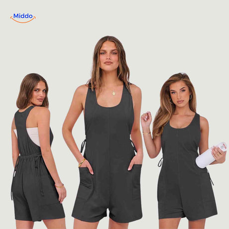 Gray jumpsuit with adjustable drawstring waist and storage pockets.