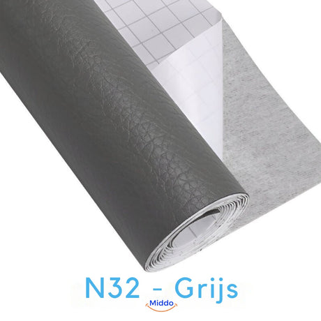 Gray self-adhesive leather patch for neutral gray furniture restoration.
