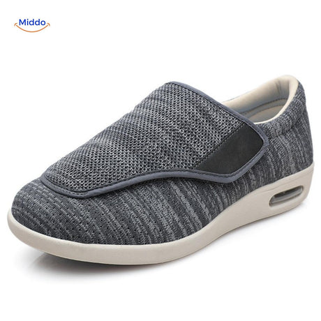 Gray mesh support shoes with cushioned interior lining.