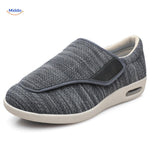 Gray mesh support shoes with cushioned interior lining.