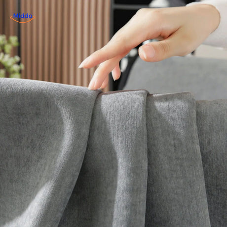 Close-up texture of gray CheniLux sofa cover, highlighting soft chenille weave and tactile quality.