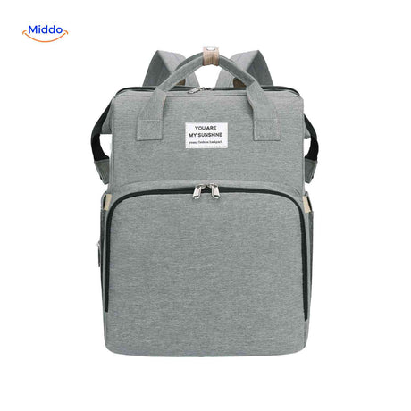 Gray trendy diaper backpack with foldable bassinet and practical organization.