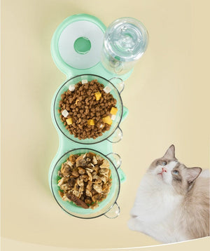 Green TripleFeeder cat tray filled with dry cat food kibble.