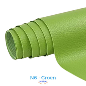 Green self-adhesive leather patch for green-toned furniture restoration.